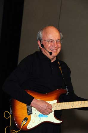 Jim Clayton plays guitar, MHI Congress and Expo 2010, Photo courtesy MHI, Lisa Stewart Photography
