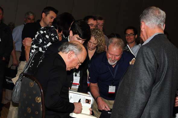 Jim Clayton signs his book for attendees, MHI Congress and Expo 2010, Photo courtesy MHI, Lisa Stewart Photography