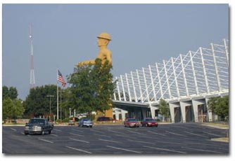 Quick Trip Center with the "Golden  Driller" the largest free standing statue in the world.
