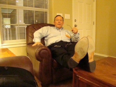 Bill Danforth posing as if relaxing in this own living room.